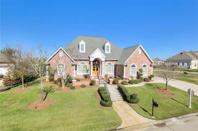 Waterfront home with boat dock and lift on 90 ft of waterfront in Slidell.